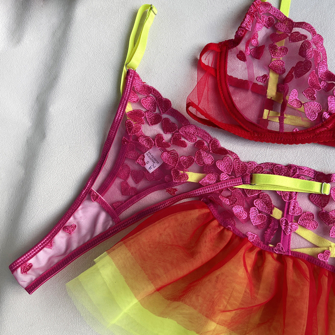 Neon Love Affair: Bright Pink Lingerie Set with Heart Embroidery, Neon Yellow Accents, and Playful RufflesNeon Love Affair: Bright Pink Lingerie Set with Heart Embroidery, Neon Yellow Accents, and Playful Ruffles
